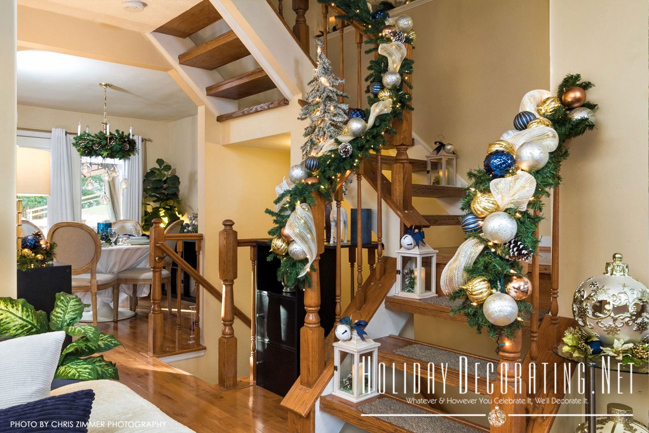 Staircase Decorated In Navy For Christmas